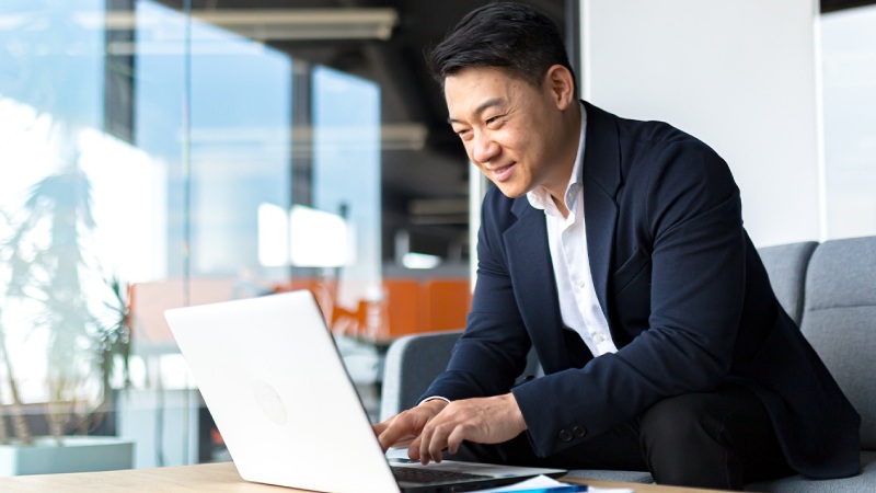 A man with a laptop