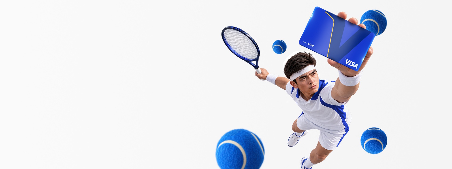 A tennis player in a white uniform reaches forward to hold up a blue Visa credit card, surrounded by floating tennis balls and a racket.