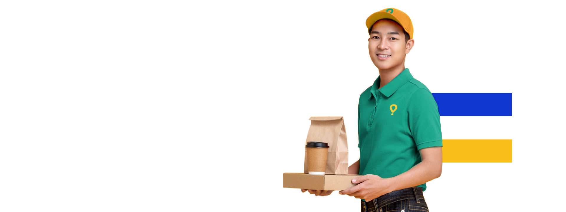 Smiling delivery person in a green uniform holds a tray with a coffee cup and paper bag.