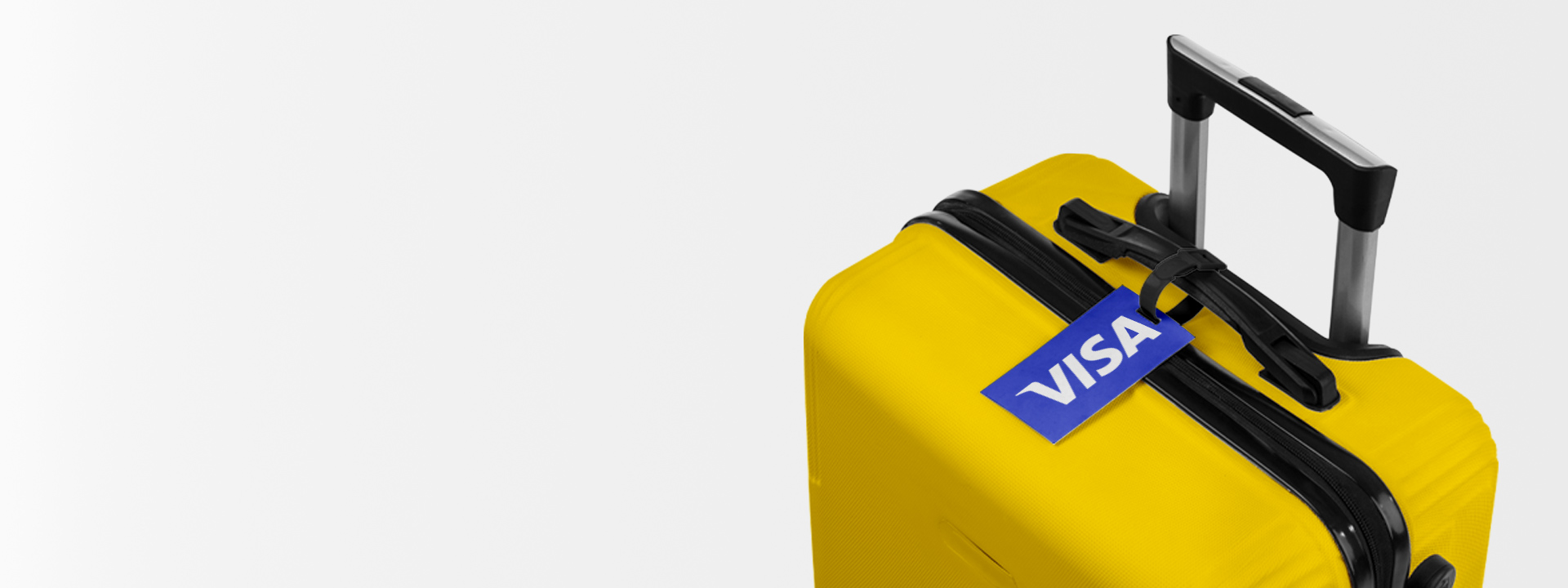 A yellow suitcase with a Visa tag attached to the handle against a plain background.