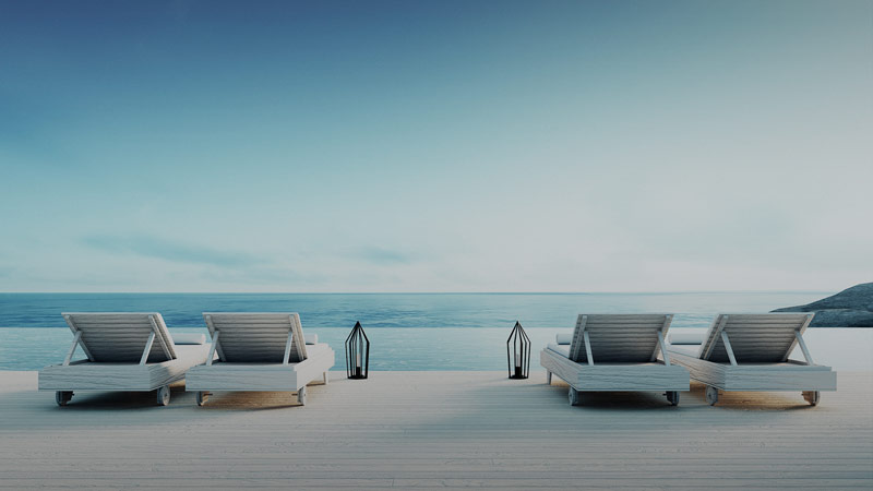 Secluded sun loungers against the tranquil sea