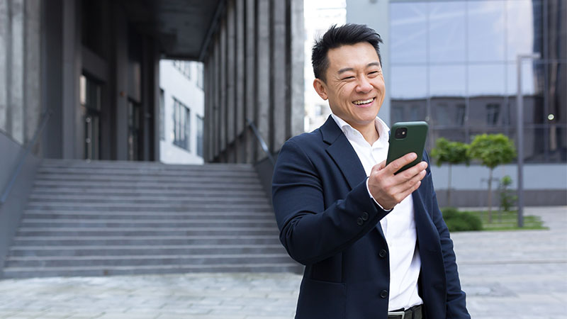 A Kazakh man with a smartphone